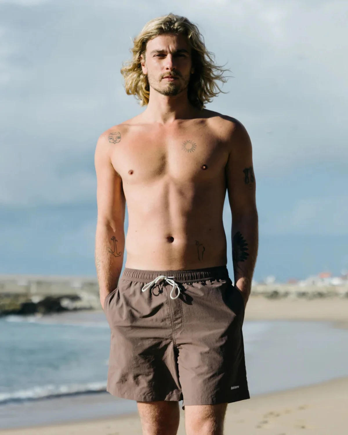 Finisterre men’s swimwear made from recycled nylon with focus on traceability and sustainable sourcing.