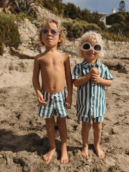 Non-toxic kids' swimwear made from organic cotton and certified recycled fabrics for safer materials.